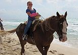 Monta a caballo en la playa