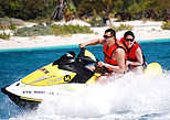 challenging the Caribbean's waves on a Waverunner